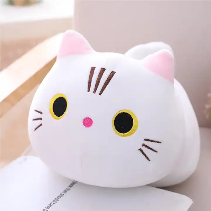 A cute plush doll of a white kitten, showcasing its adorable features and soft, cuddly fur – a perfect feline friend for cozy moments