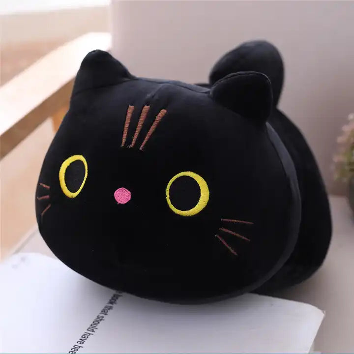 A cute plush doll of a black kitten, showcasing its adorable features and soft, cuddly fur – a perfect feline friend for cozy moments