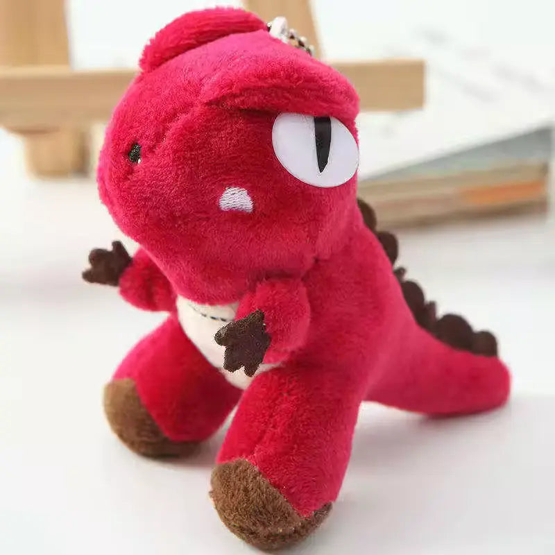 Red dinosaur toy keychain