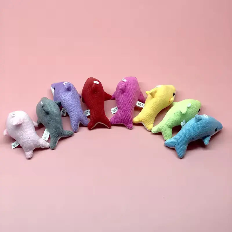 Row of mini whale stuffed animals