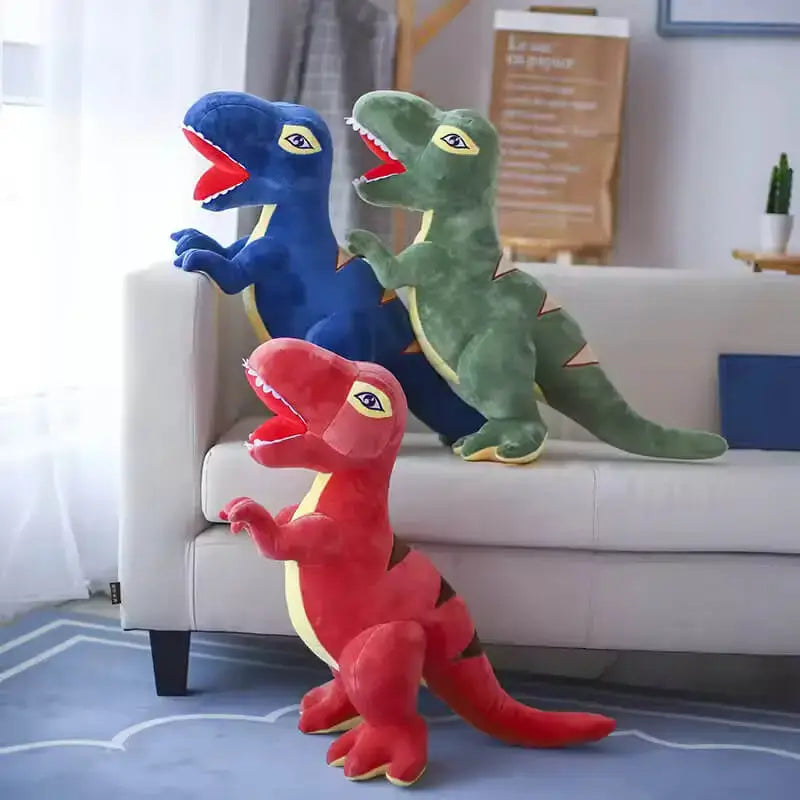 Three dinosaur plush toys on the sofa