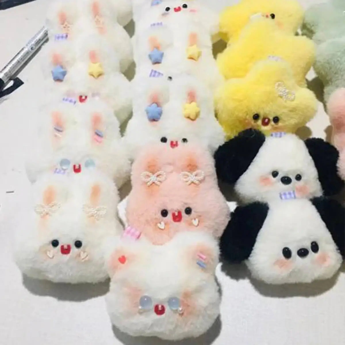 Three rows of custom anime style rabbit cuddly toys