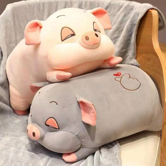 Two mini pig plush toys