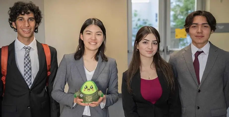 Angelique Ronald's stuffed toy in hand