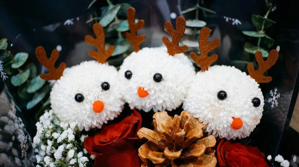 Tre små Elch-Plüschtiere