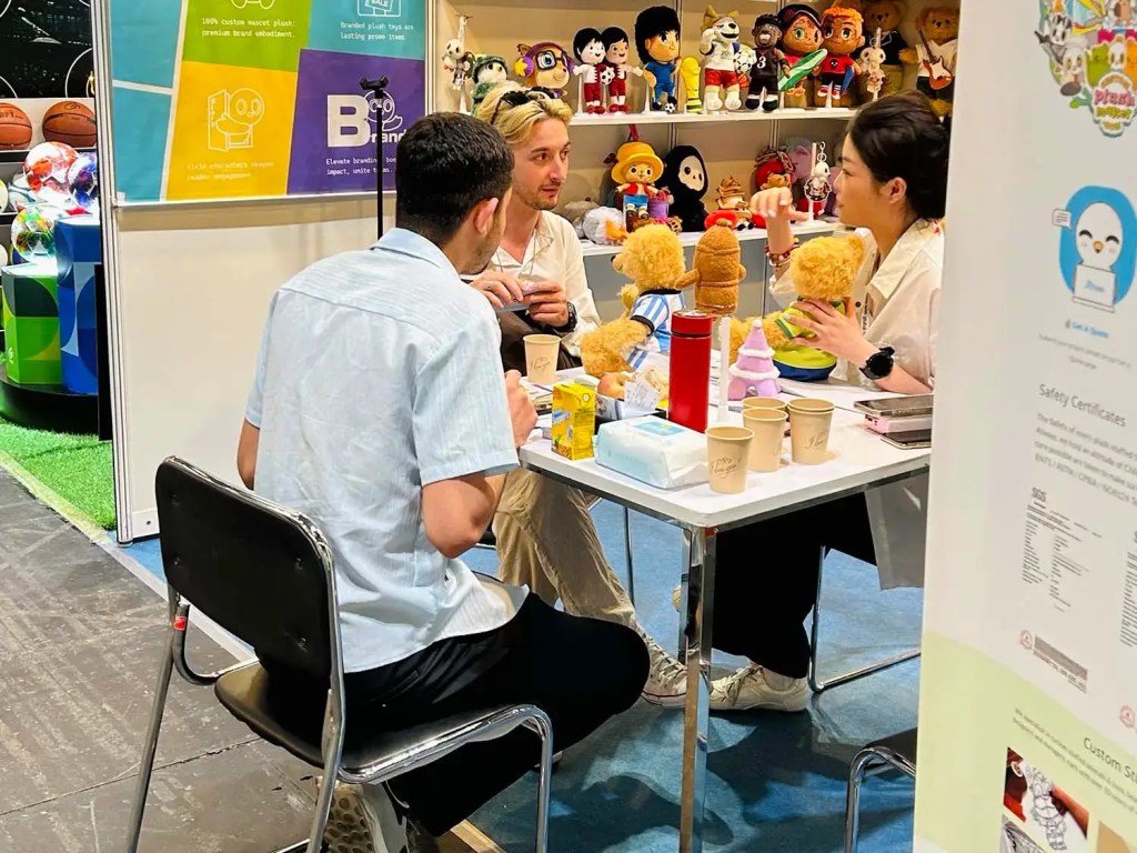 At the Global Sources trade show in Hong Kong, our sales manager is introducing our plush toys to a customer.