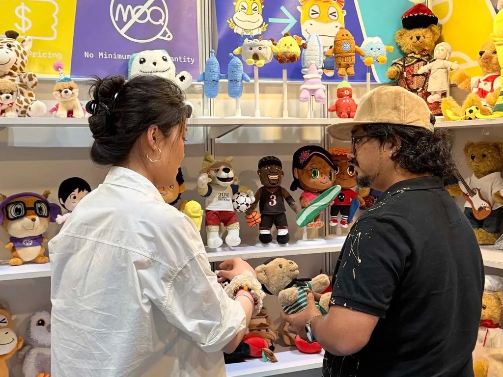 At the Global Sources trade show in Hong Kong, our sales manager is introducing our plush toys to a customer.