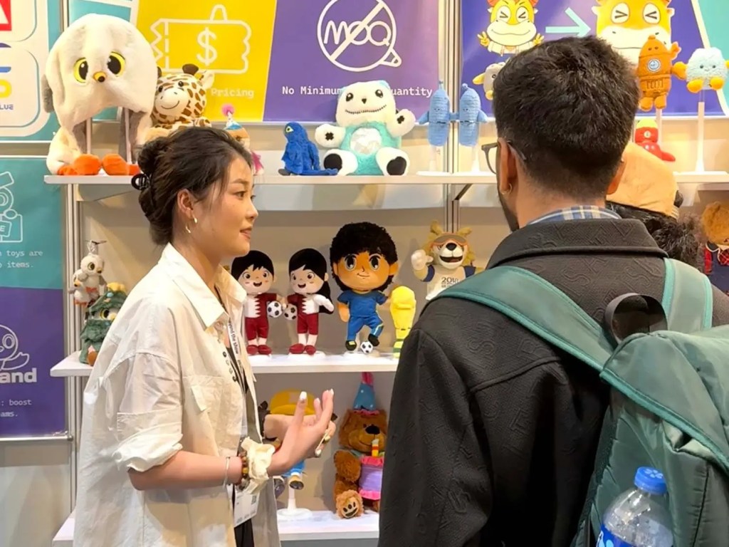 At the Global Sources trade show in Hong Kong, our sales manager is introducing our plush toys to a customer.