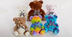 Four teddy bears of different colors