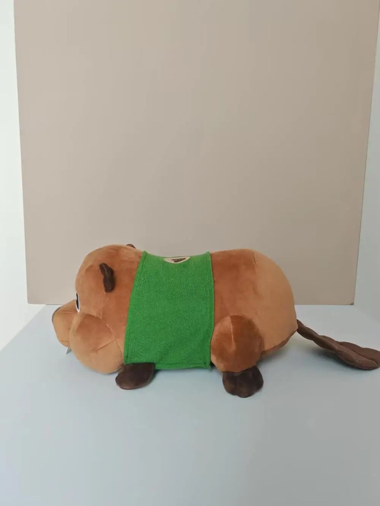 Side view of beaver plush toy